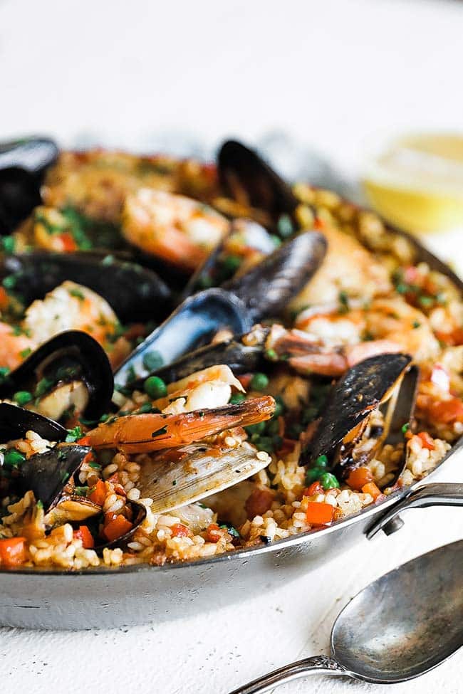 valencian paella with seafood in a pan