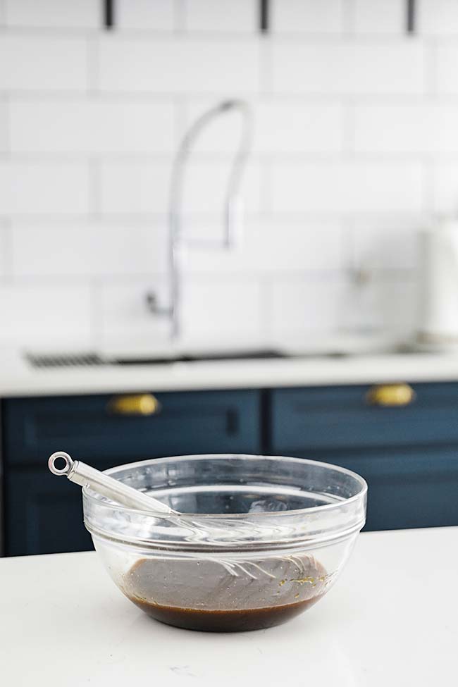 soy and hoison marinade in a bowl on the counter top