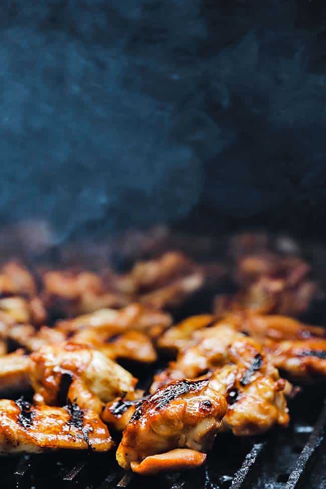 marinated chicken wings grilling on the grill