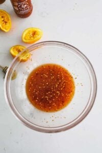 chili garlic sauce with orange and honey in a bowl