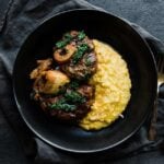 osso bucco recipe with gremolata and polenta on a plate