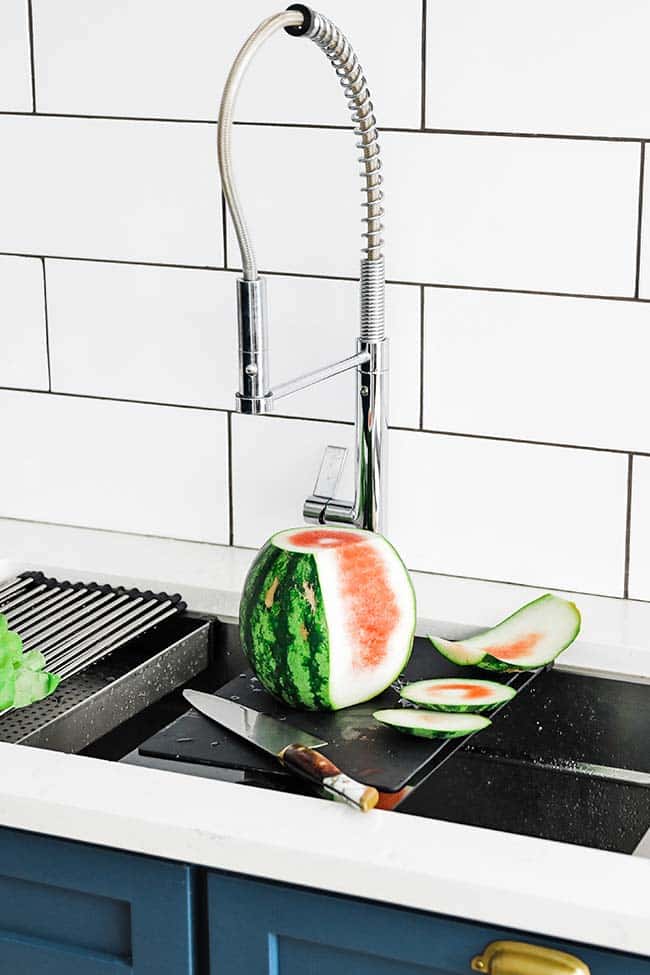 trimming watermelon on the frank chef center cutting board