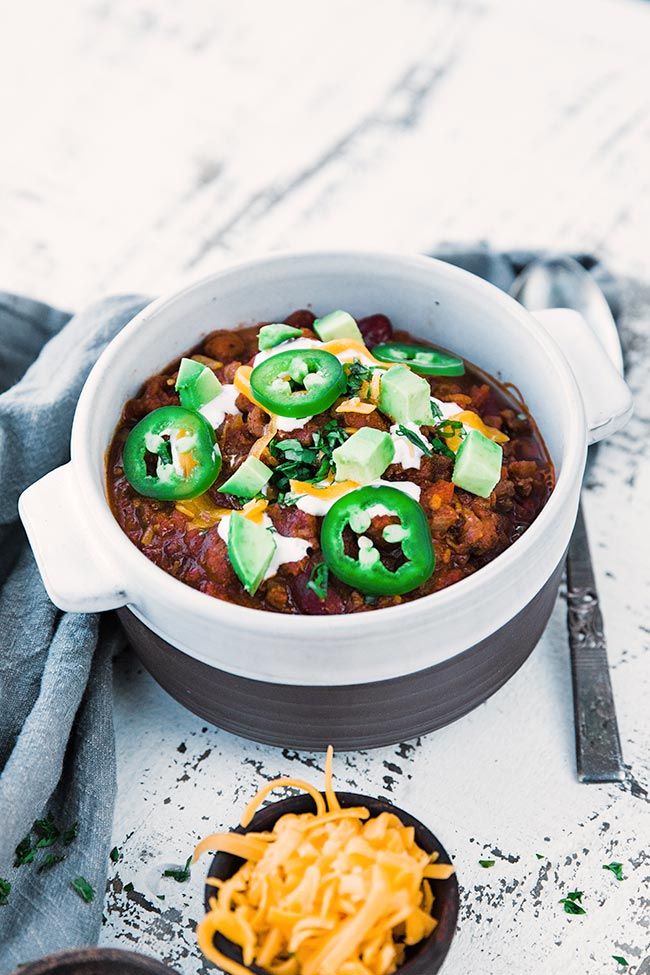 delicious easy to make chili recipe with toppings in a chili bowl