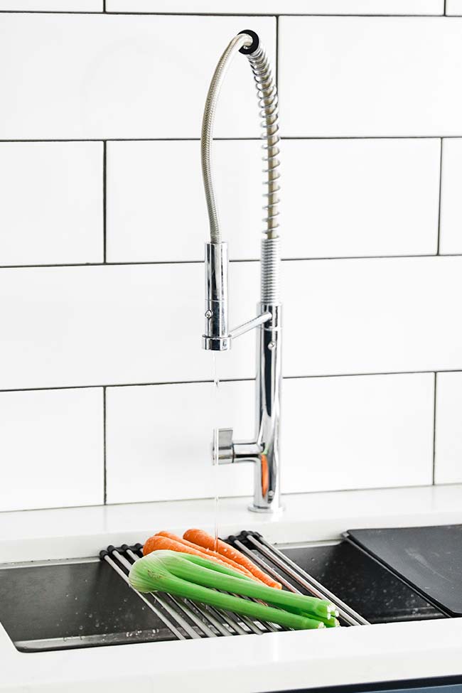 rinsing off celery and carrots in the franke chef center