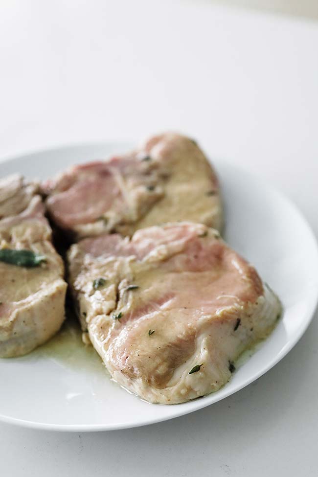 marinated pork chops on a plate