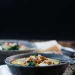 bowl of sausage, kale, bean and potato soup