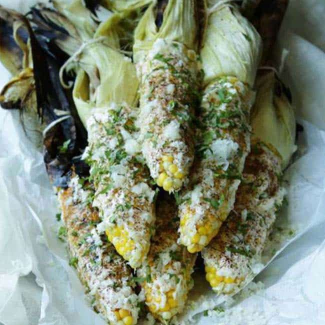 shucked corn elote with cheese