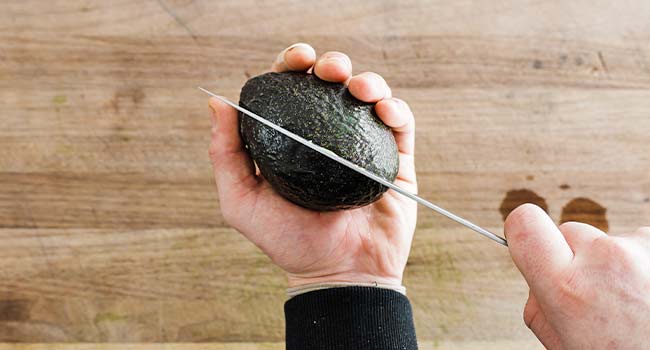 slicing an avocado