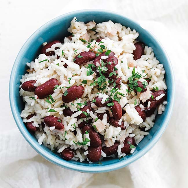 bowl of rice and beans with parsley