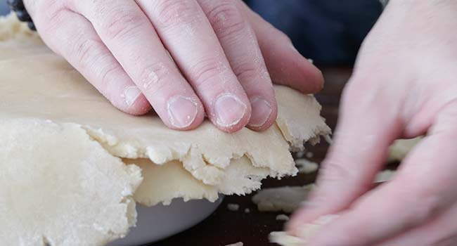 trimming of excess pie crust