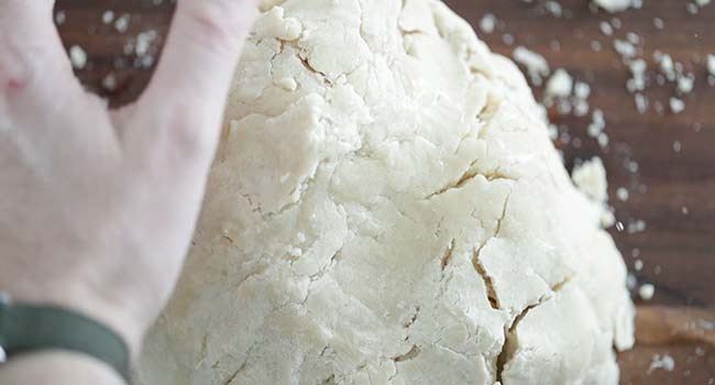 kneading pie dough