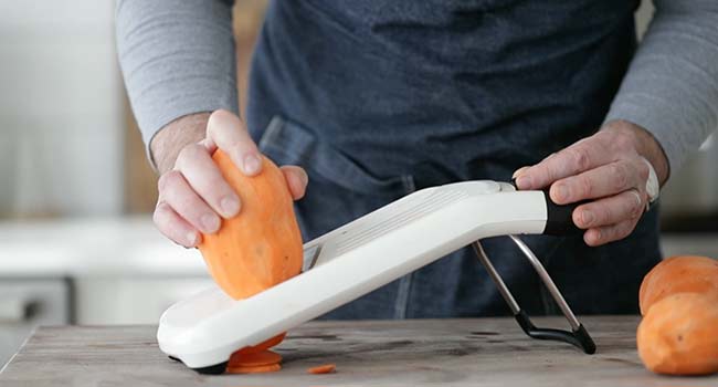 slicing potatoes