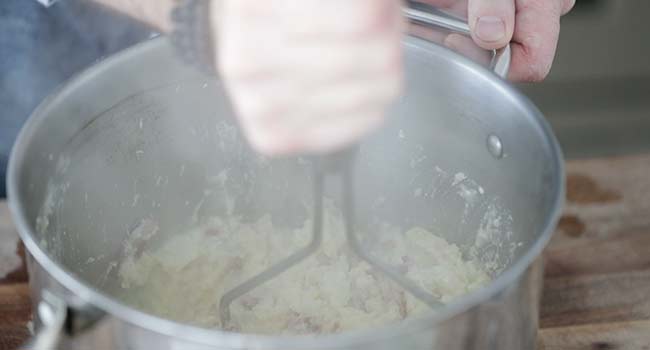 mashing potatoes