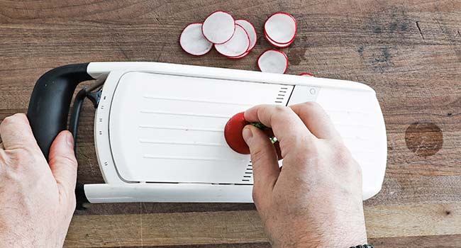 slicing radishes