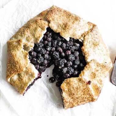 blueberry crostata on parchment paper
