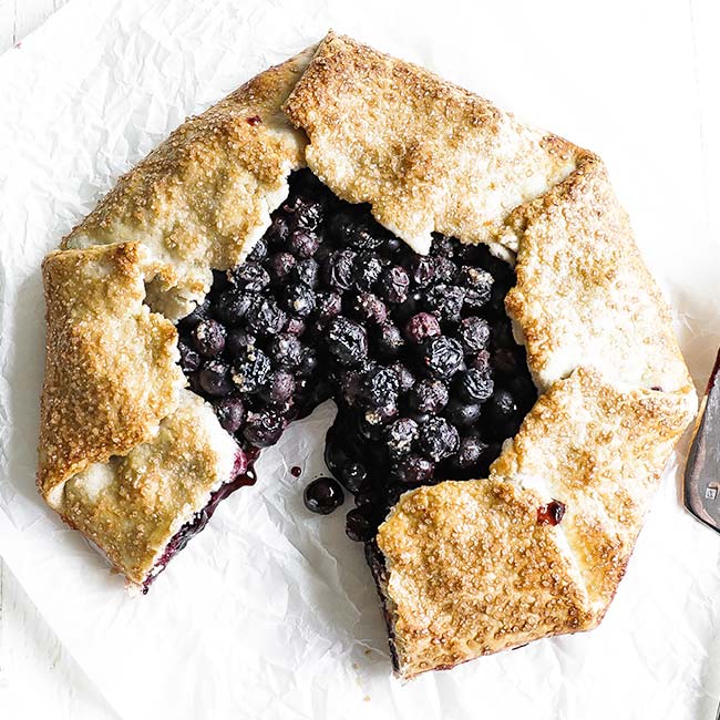 blueberry crostata on parchment paper