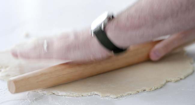 rolling out dough on a clean surface