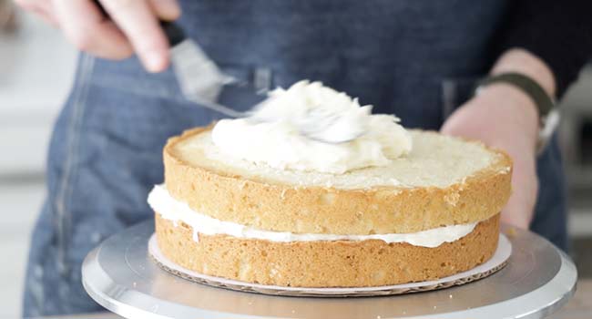 icing a coconut cake