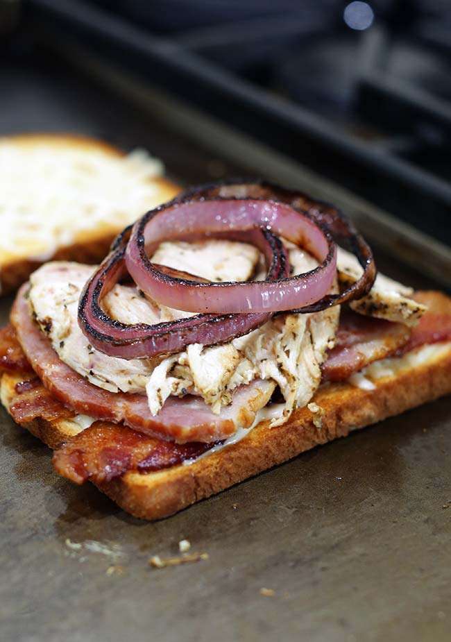 chicken melt being prepared