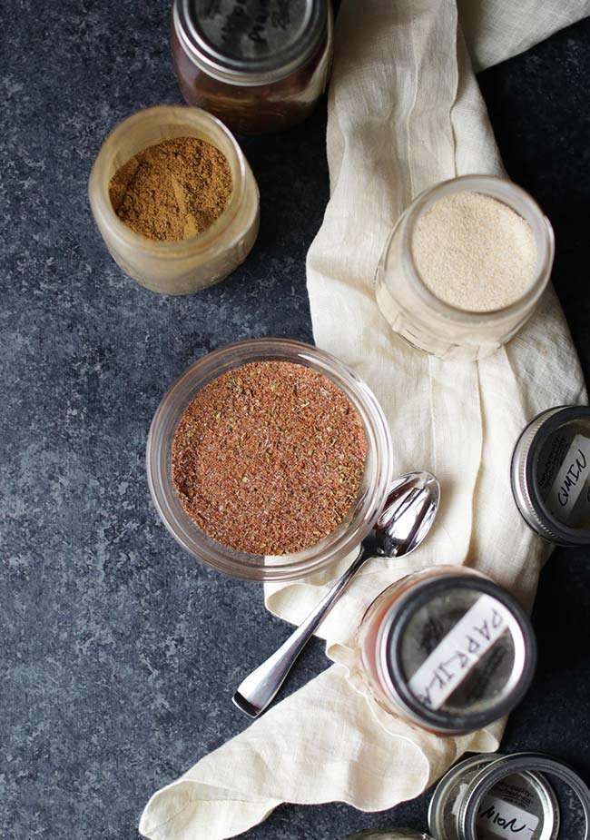 spices in a jar to make a rub for spicy salmon