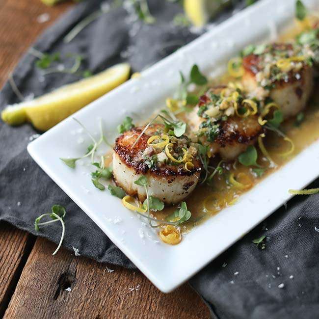 Pan Seared Scallops with White Wine and Herb Butter Sauce