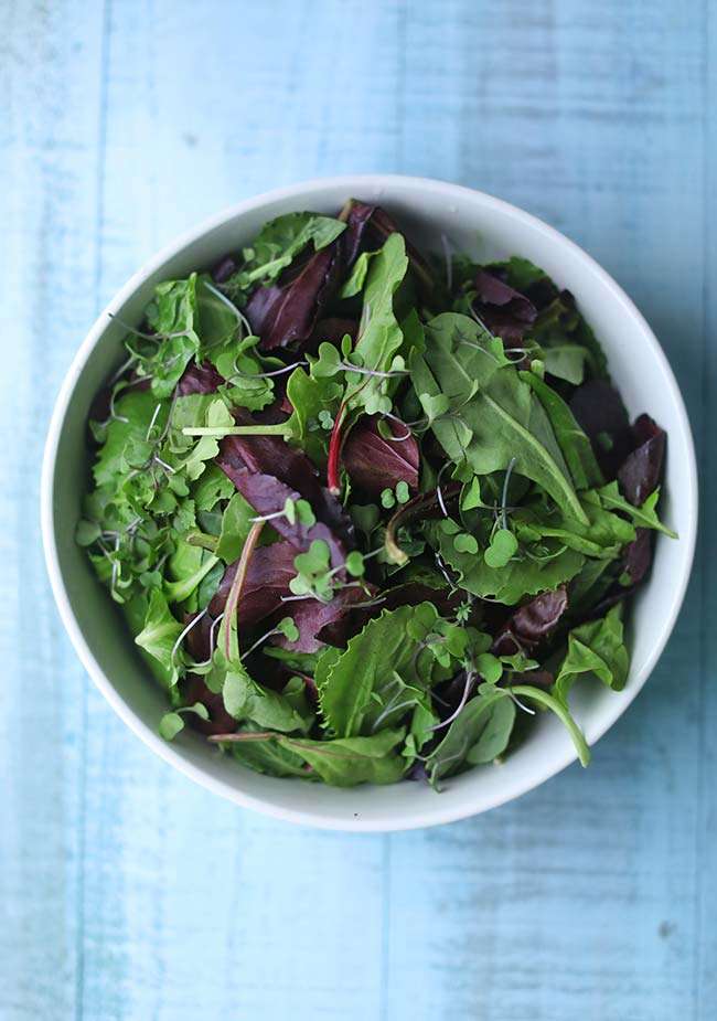 bowl of fresh leafy greens.