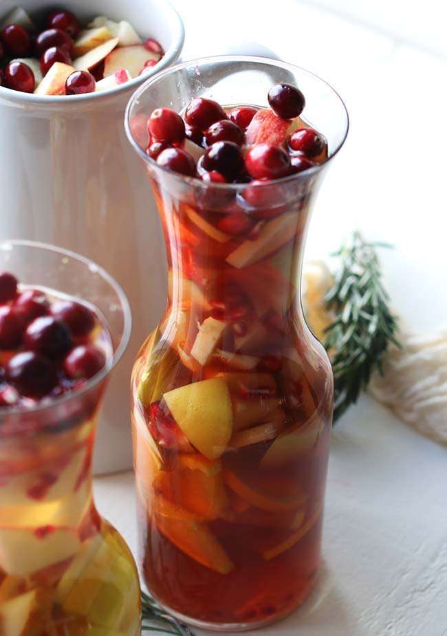 fall sangria with fresh cranberries and fresh apples