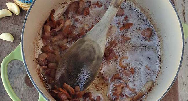 crispy cooked bacon in a pot