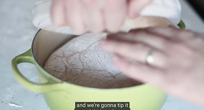adding artisan bread dough to a hot pot