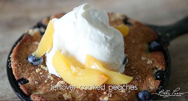 adding ice cream to peach cobbler