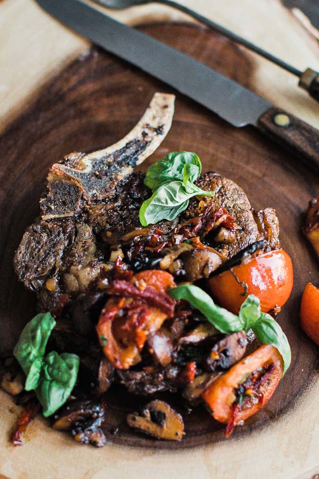 ribeye steak on a cutting board