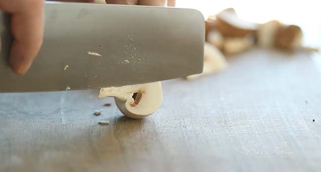 slicing mushrooms