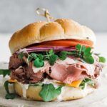 roast beef sandwich on a cutting board