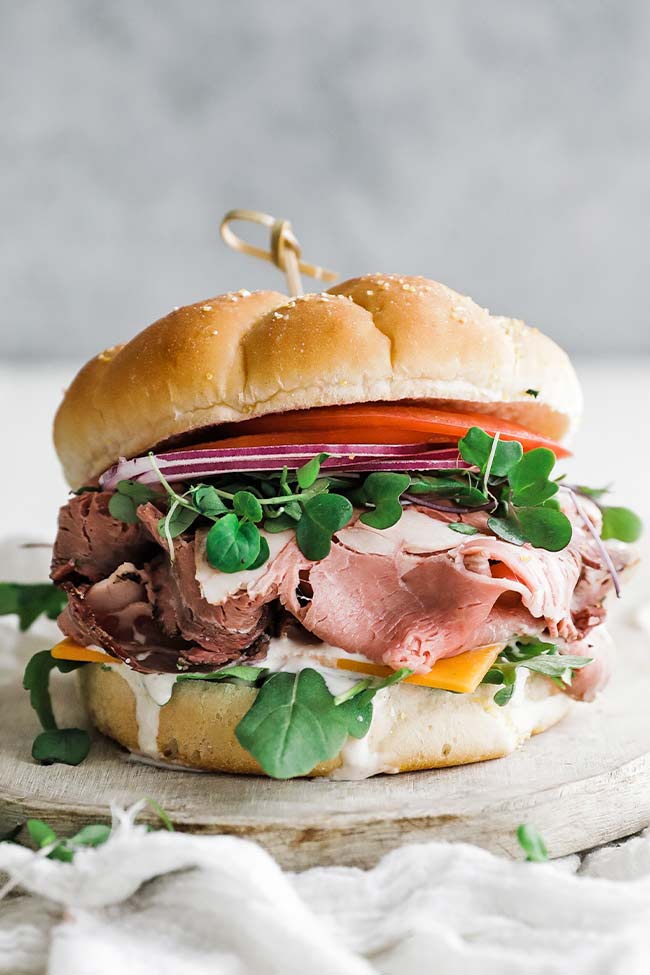 roast beef sandwich on a cutting board