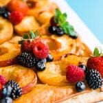 peach tart with berries