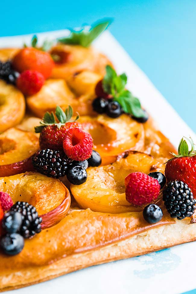 peach tart with berries