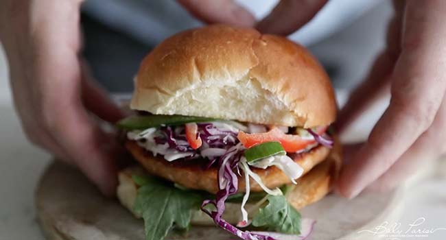 assembling a salmon burger