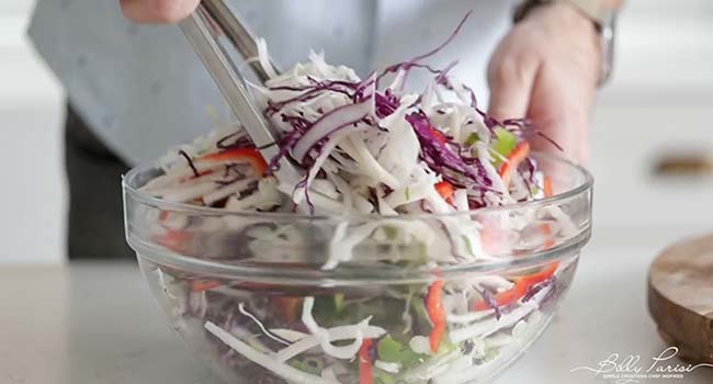 tossing fresh cut vegetables