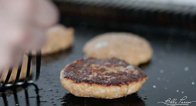 cooking salmon patties on a griddle