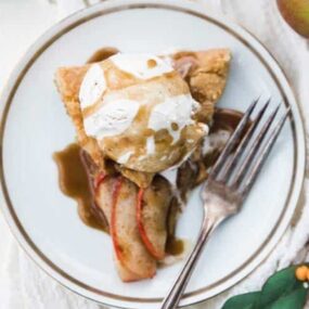 slice of apple galette with caramel and ice cream