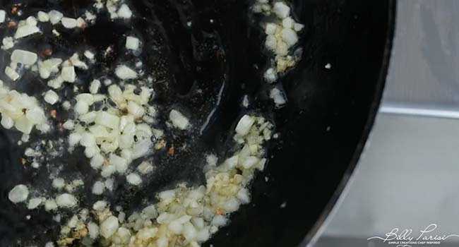 cooking garlic in a pan