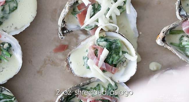 adding cheese to an oyster