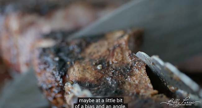 slicing a steak