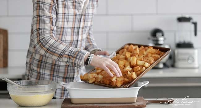 adding crust croissants to a casserole dish