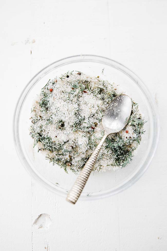salt mixture for gravlax recipe in a bowl with a spoon