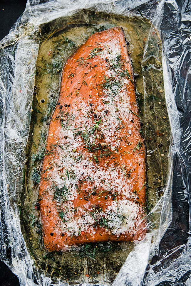 cured salmon gravlax recipe that is unwrapped and ready to be rinsed off