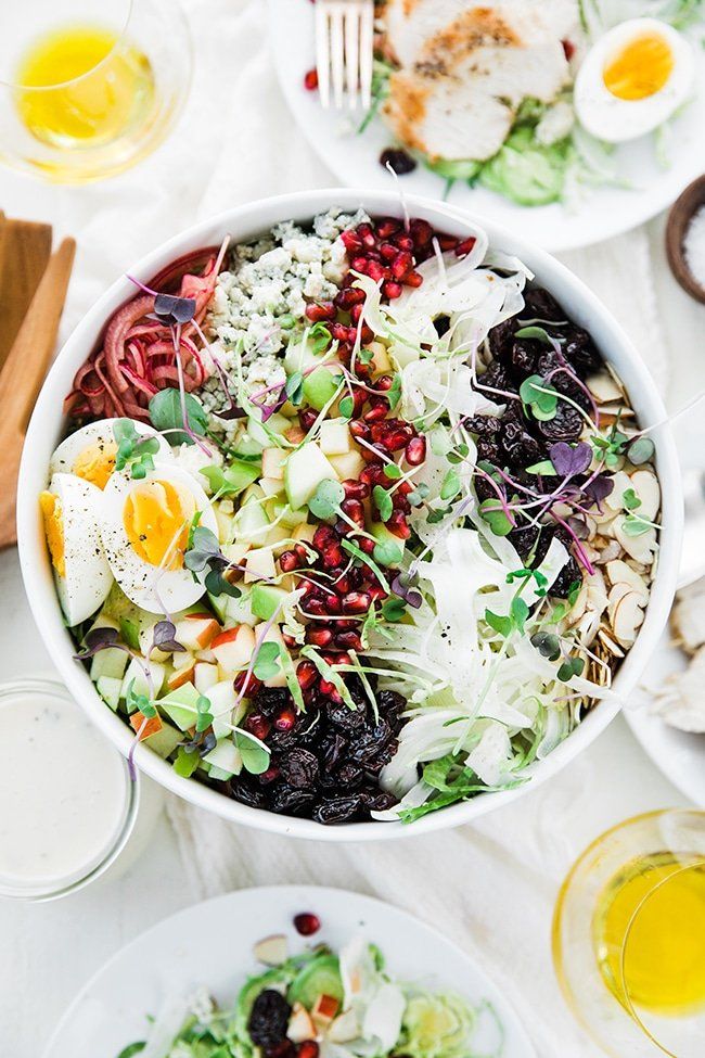 bowl of salad with assorted toppings