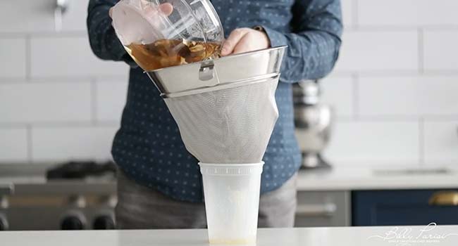 straining porcini mushrooms