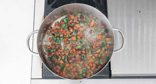 cooking onions and peppers