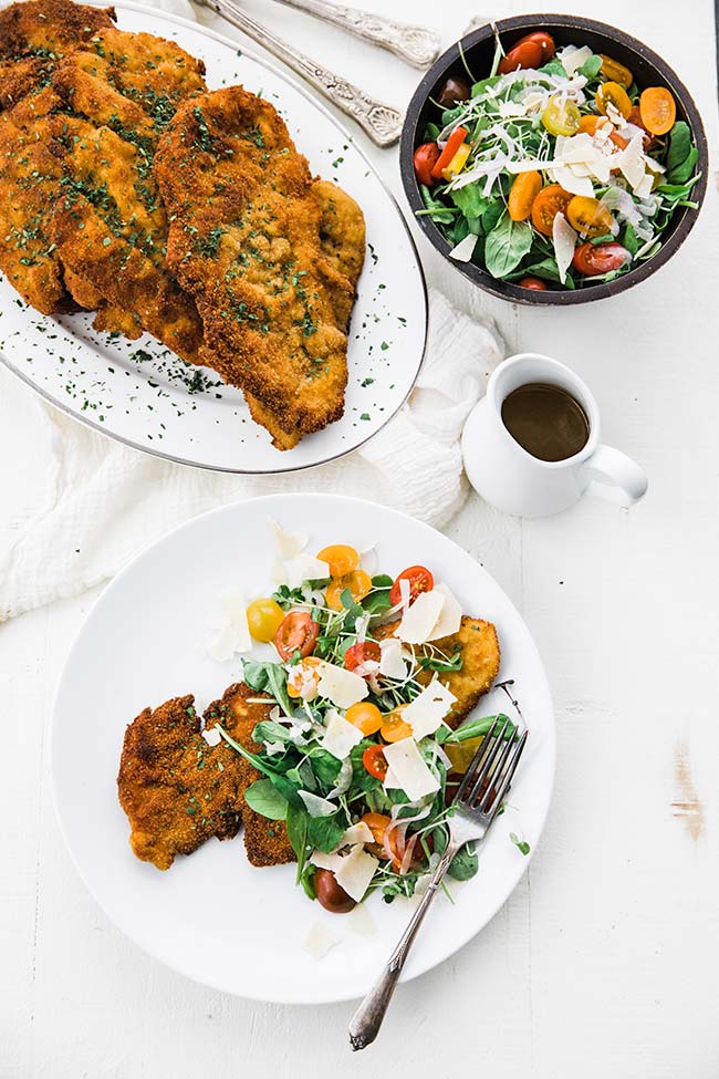 salad with fried chicken cutlets and a homemade salad dressing